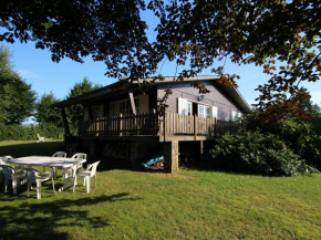 Отель Detached chalet with views of the lake of Butgenbach in the middle of nature  Бютгенбах